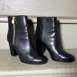 Michael Kors Black Heeled Boots with Gold Accent
